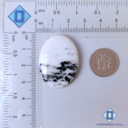 Cabujones ovalados de ágata de punto negro de 32 x 24 x 5 mm