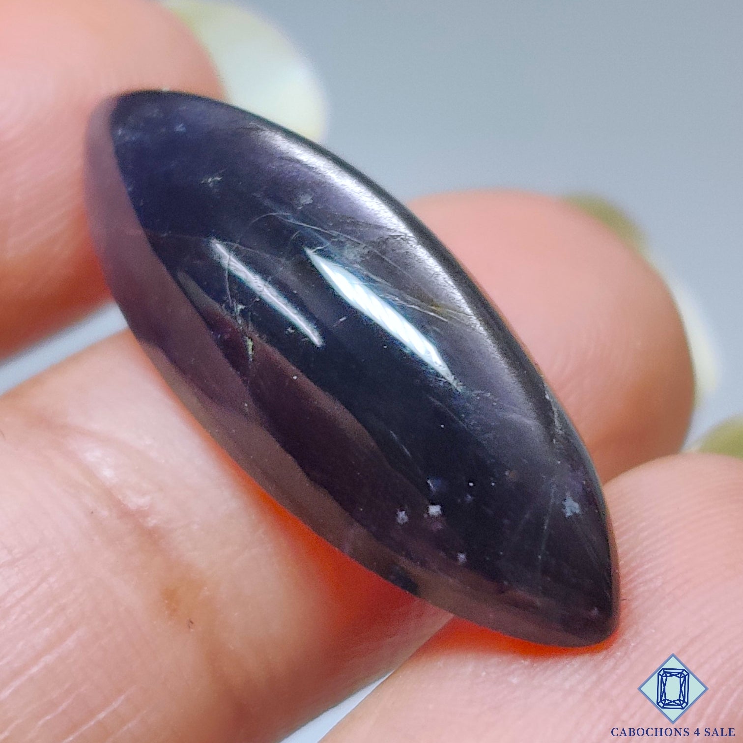 0-Black_ Sunstone-C4sw21243-2-Marquise-Blue-mm-Cabochons-Translucent-0
