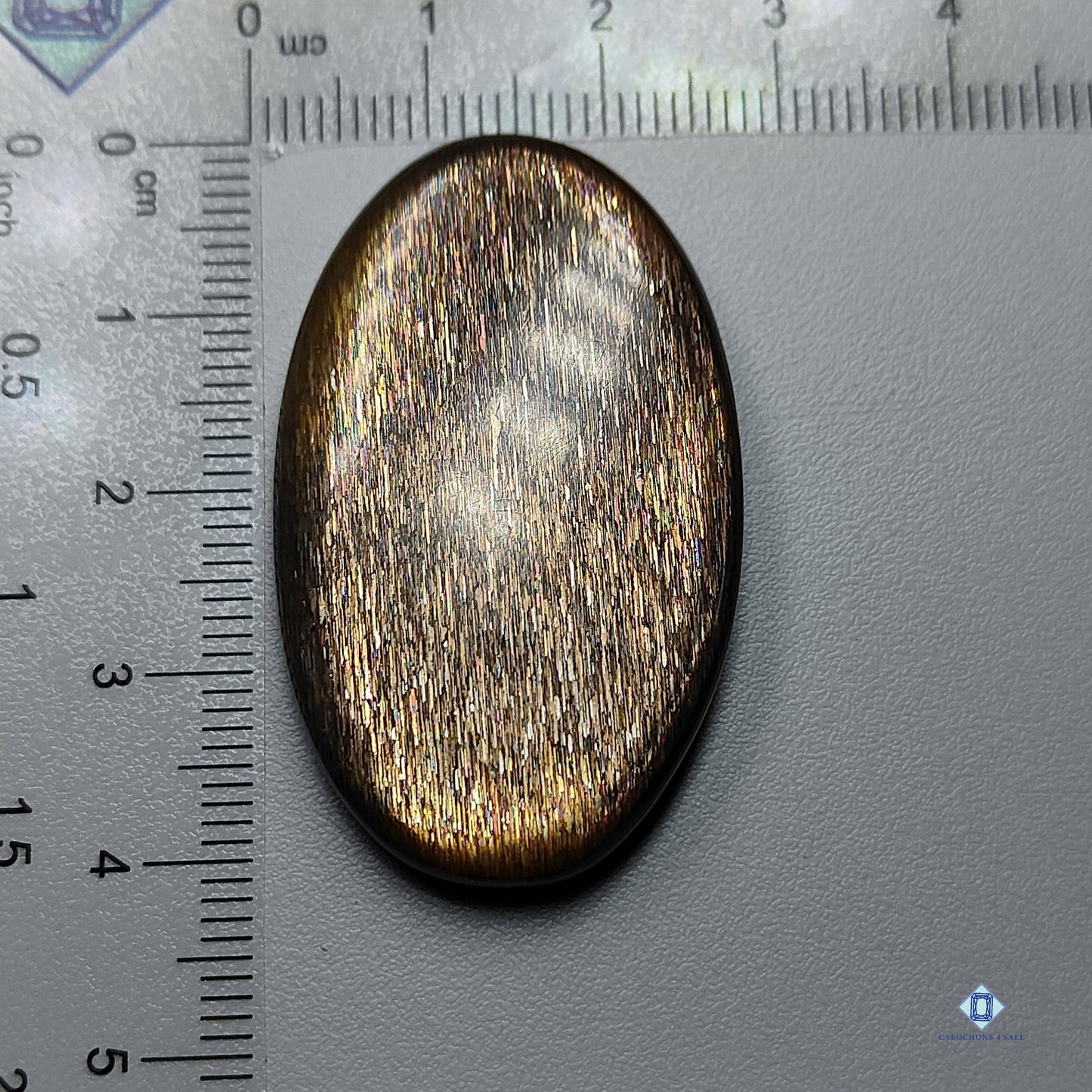 Black tanzaniai sunstone-c4sw1531-oval-black-cabochons