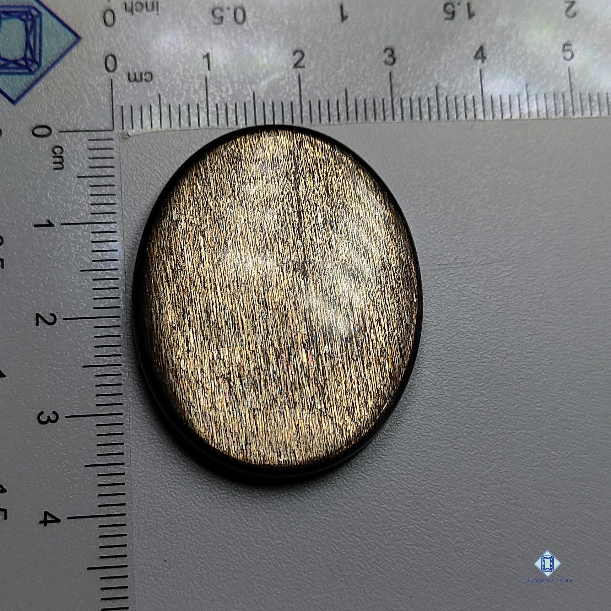 Black tanzaniai sunstone-c4sw1532-oval-black-cabochons