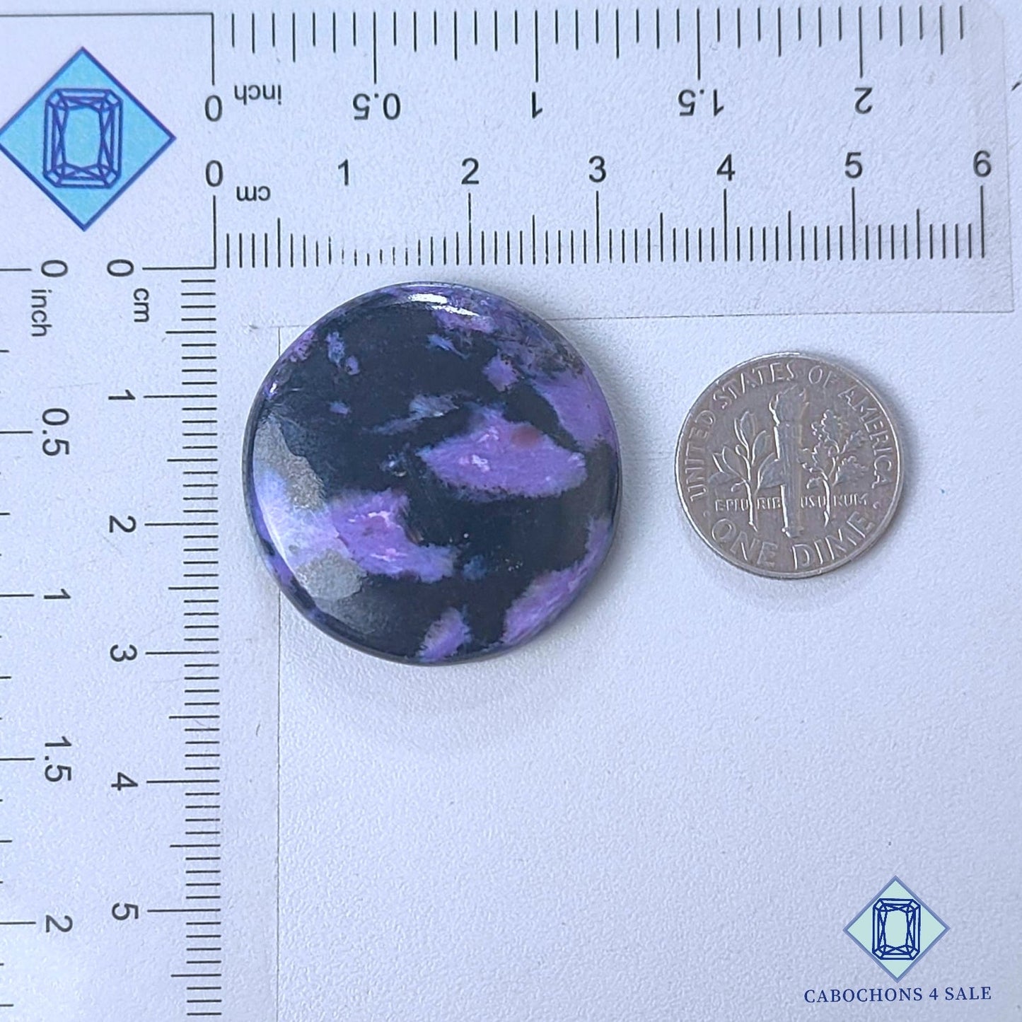 Cabujones redondos de piedra preciosa de charoita natural de 29 x 5 mm, procedentes de Rusia, disponibles para la venta.