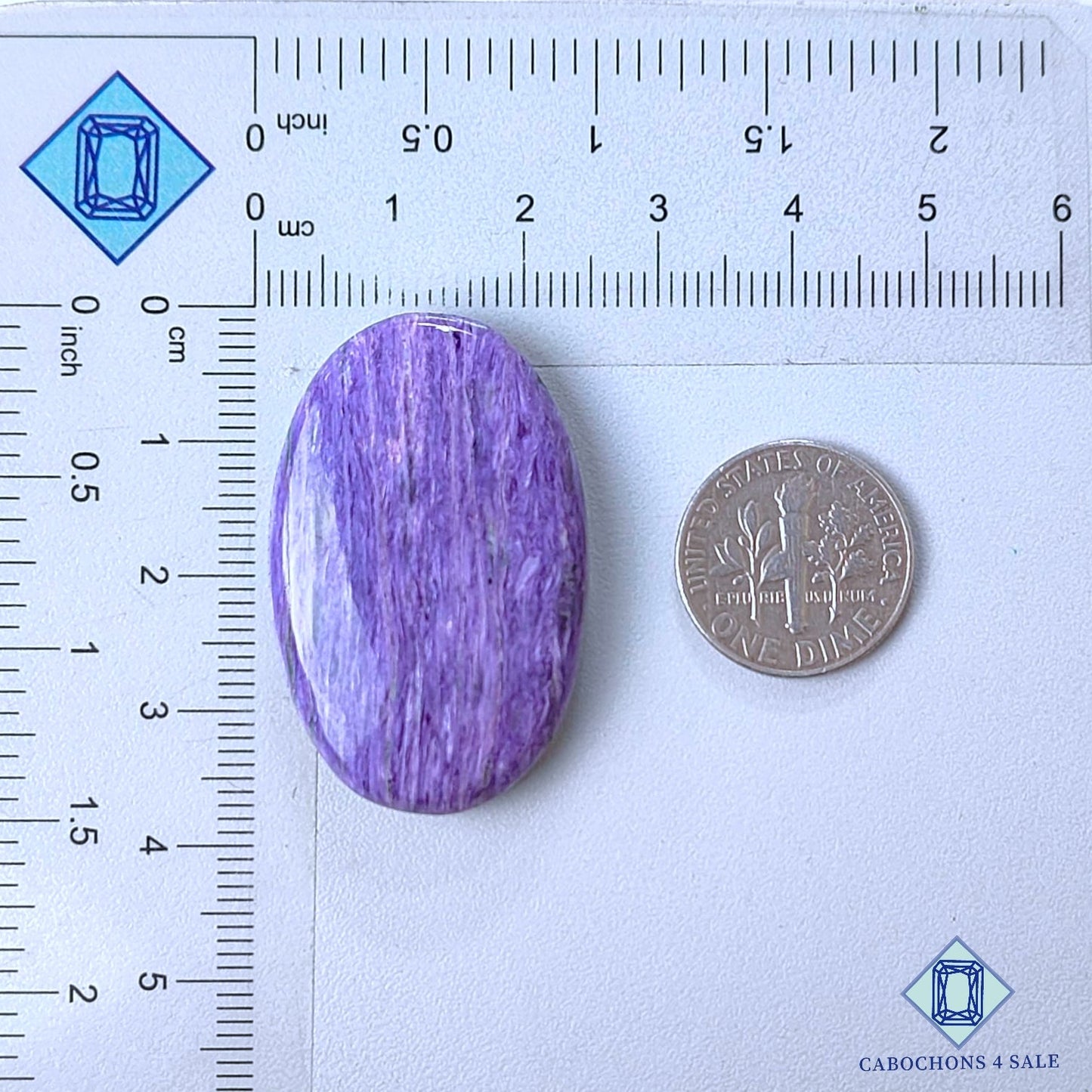 Cabujones ovalados de piedra preciosa de charoita natural de 36 x 23 x 7 mm, procedentes de Rusia, disponibles para la venta.