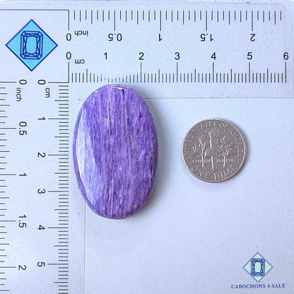 Cabujones ovalados de piedra preciosa de charoita natural de 36 x 23 x 7 mm, procedentes de Rusia, disponibles para la venta.