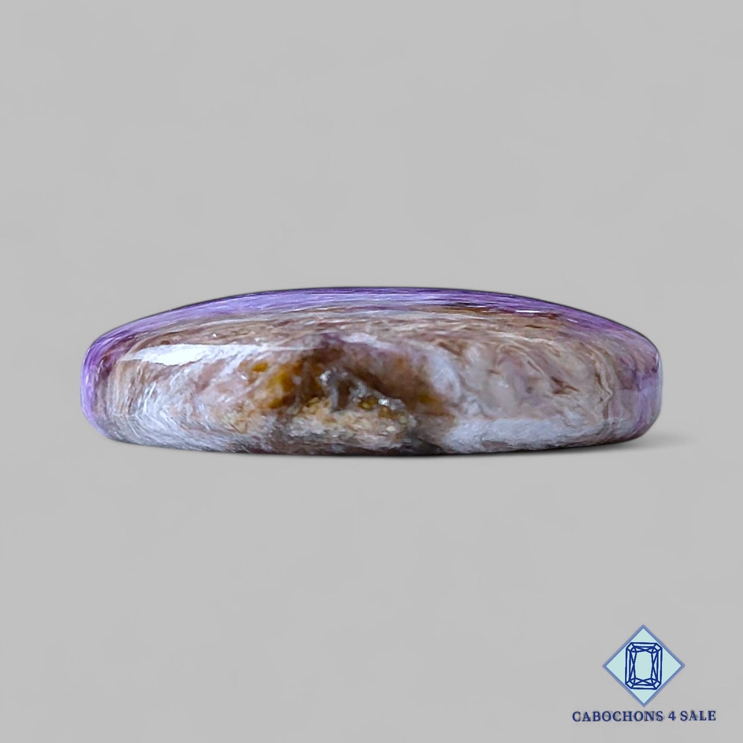 Cabujones ovalados de piedra preciosa de charoita natural de 29 x 17 x 7 mm, procedentes de Rusia, disponibles para la venta.