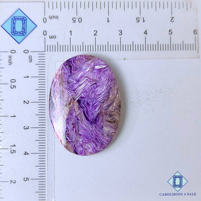 Cabujones ovalados de piedra preciosa de charoita natural de 39 x 28 x 6 mm, procedentes de Rusia, disponibles para la venta.