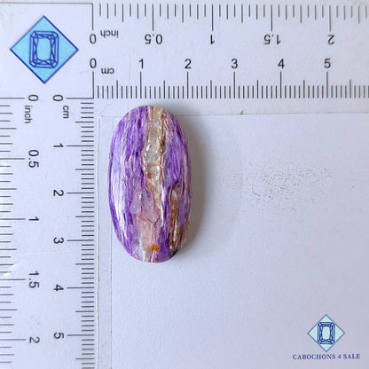Cabujones ovalados de piedra preciosa de charoita natural de 32 x 17 x 7 mm, procedentes de Rusia, disponibles para la venta.