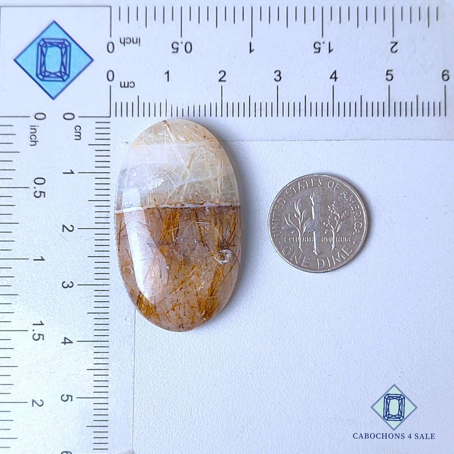 Cabujones ovalados de cuarzo rutilado de cobre natural de 38 x 22 x 7 mm, de Brasil, disponibles para la venta.