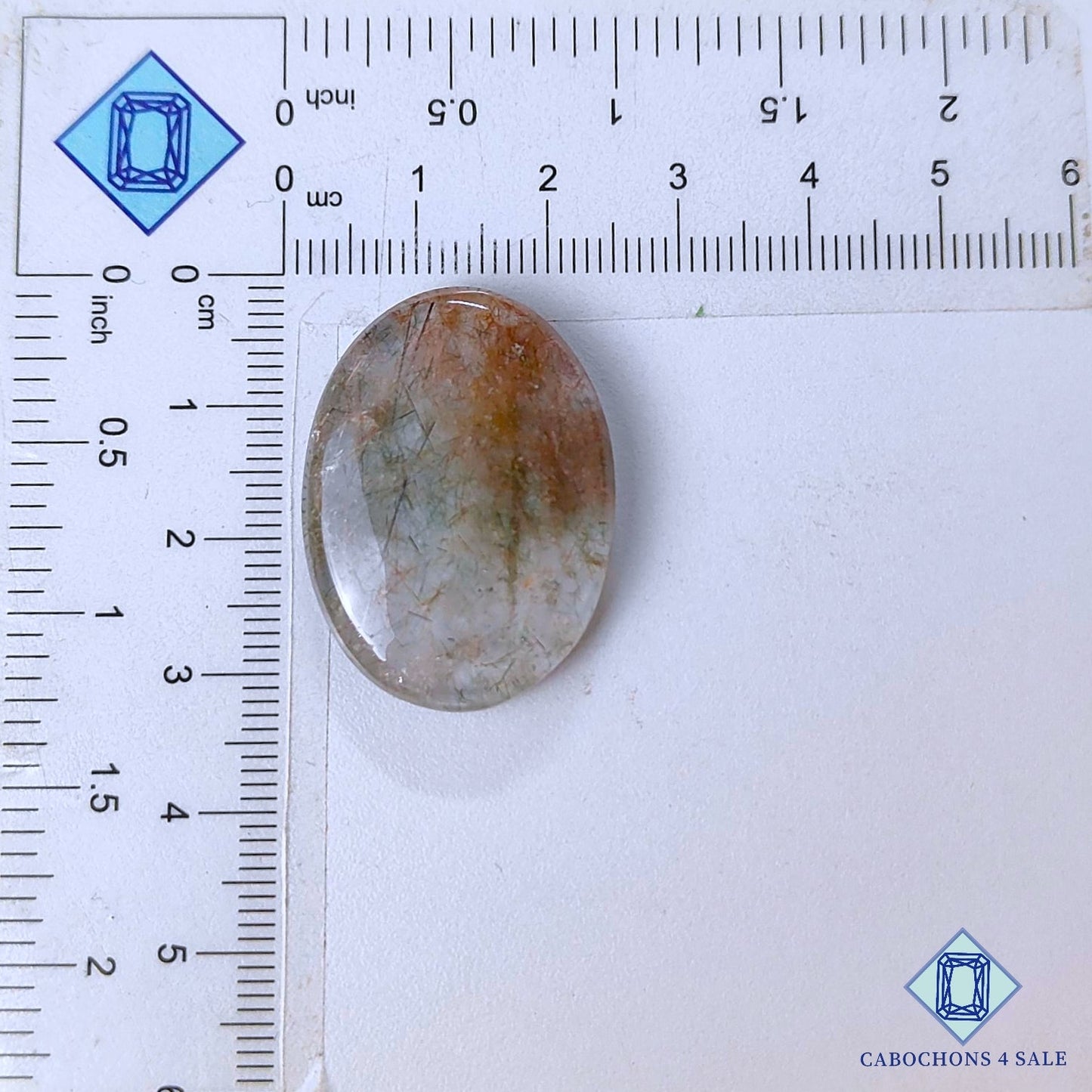 Cabujones ovalados de cuarzo rutilado de cobre natural de 31 x 23 x 6 mm, de Brasil, disponibles para la venta.