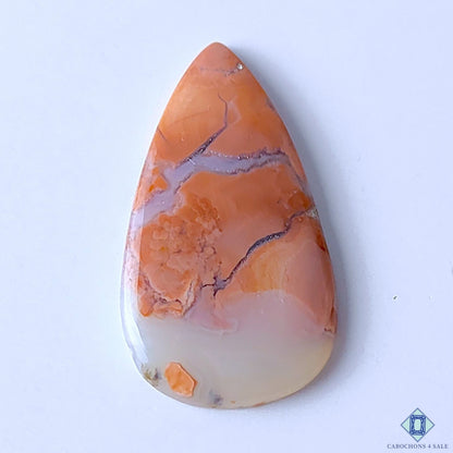 Cabochons4sale pear-shaped orange Cotton Candy Agate cabochon with natural veining and opaque finish.