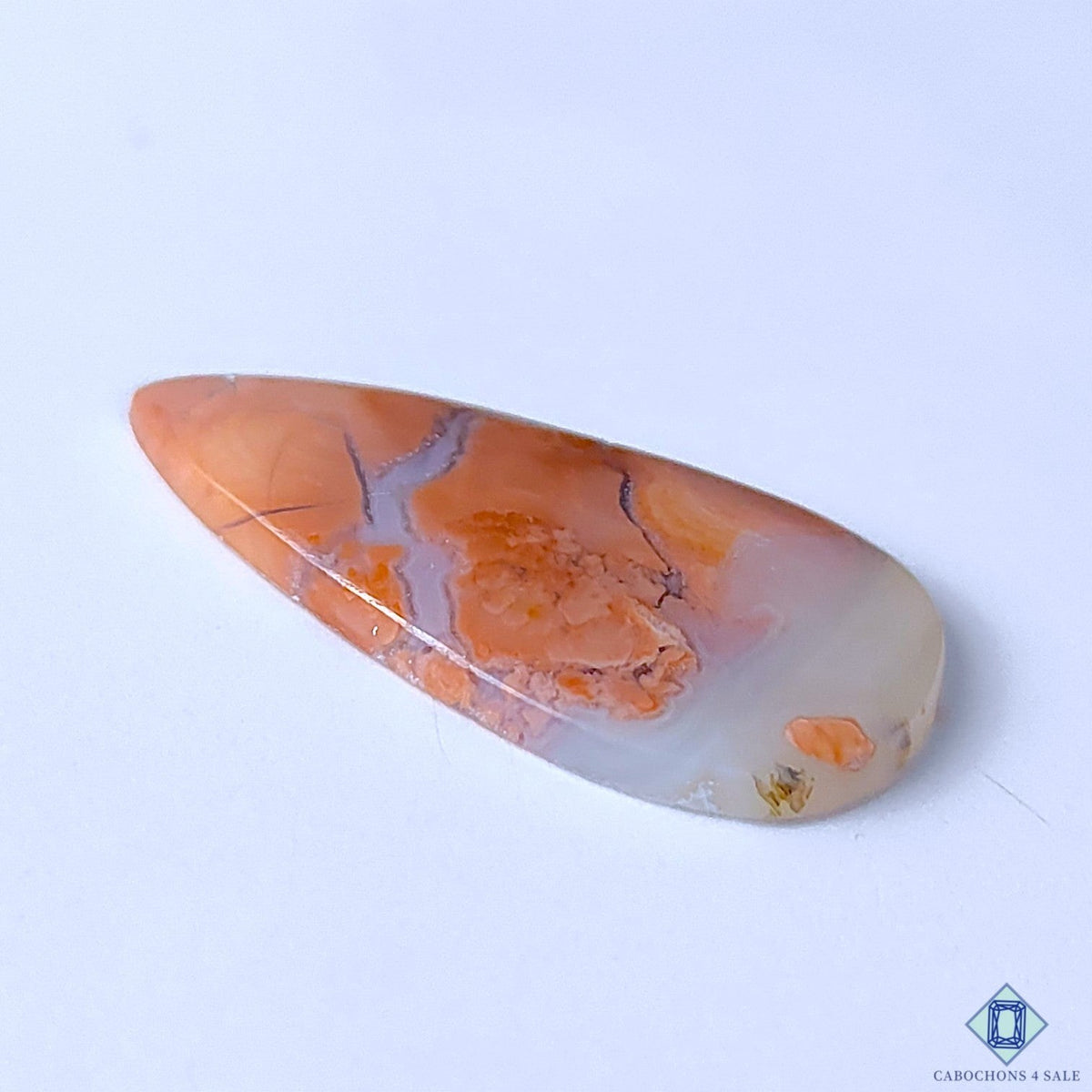 Cabochons4sale pear-shaped orange Cotton Candy Agate cabochon with opaque finish and natural stone patterns