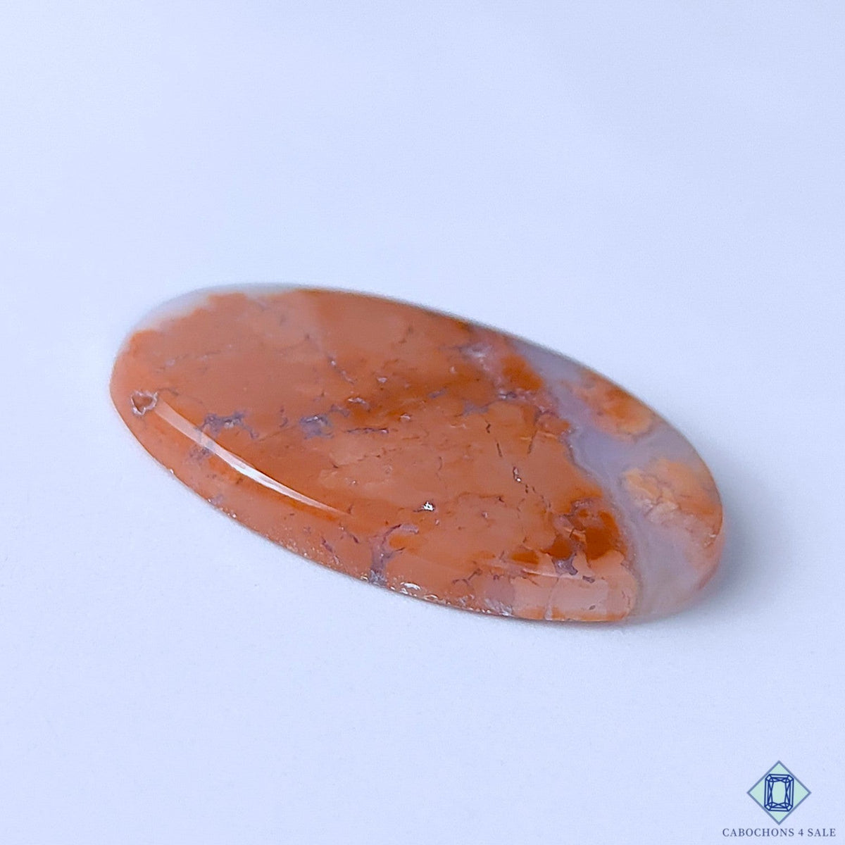 Cabochons4sale oval orange cotton candy agate cabochon with opaque finish and natural stone patterns