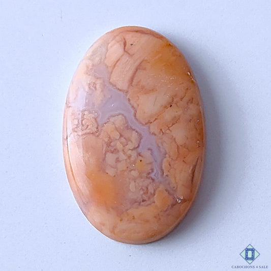 Cabochons4sale oval orange cotton candy agate cabochon with opaque finish and natural stone patterns