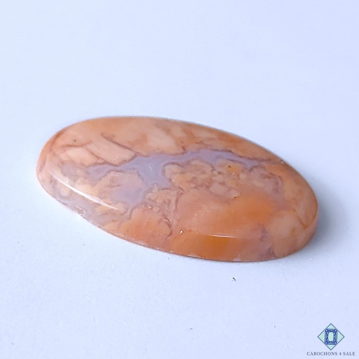 Cabochons4sale oval cotton candy agate cabochon in opaque orange with natural marbled patterns