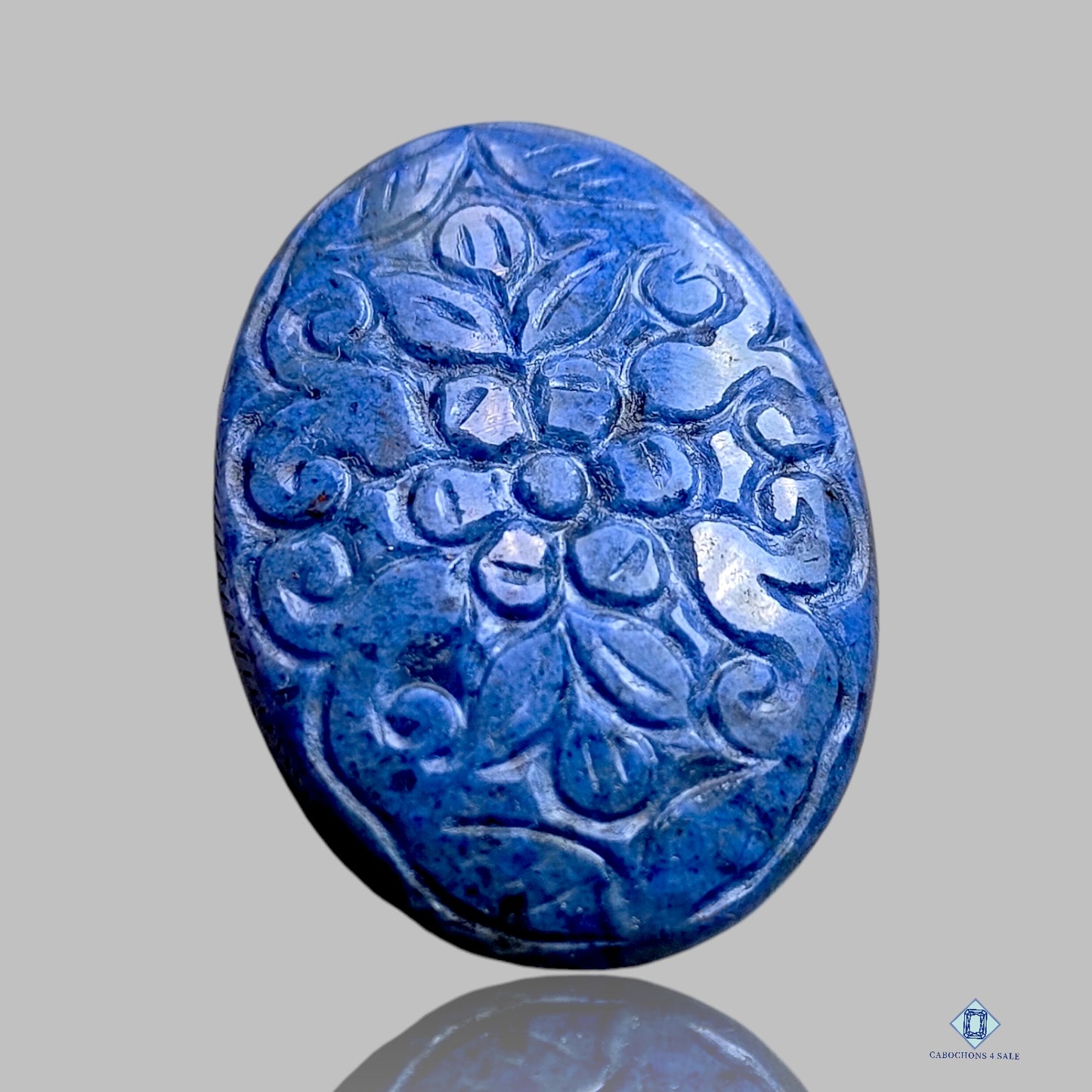 0-Dumortierite-c4sw2296-3-Oval-Blue-35_40mm-Carvings-Opaque-0