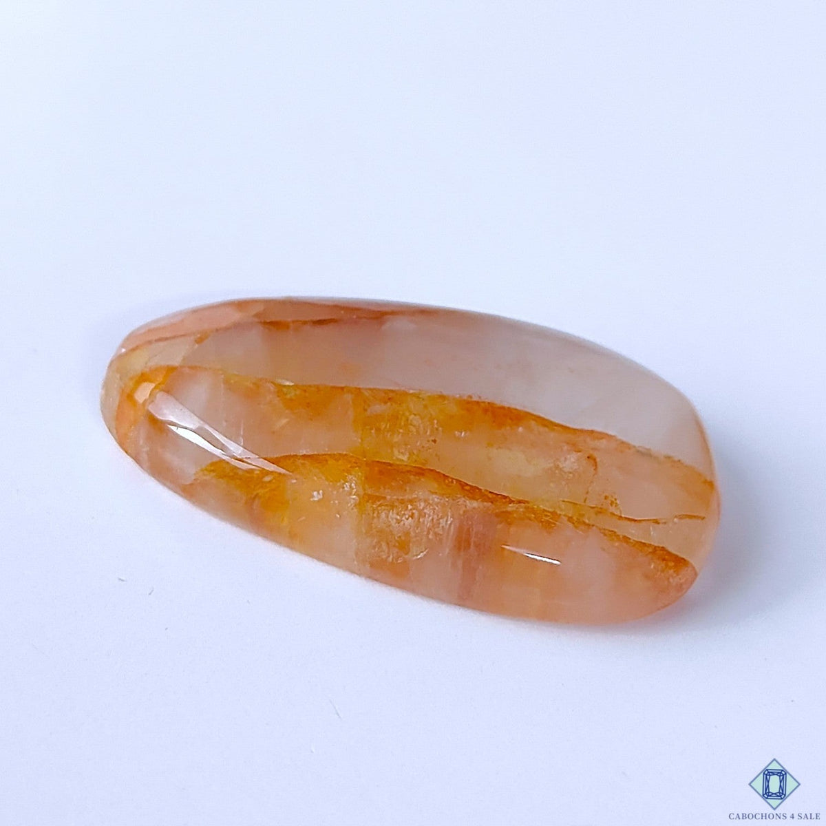 Cabochons4sale translucent pear-shaped fire quartz cabochon with red inclusions, 43x27x9mm