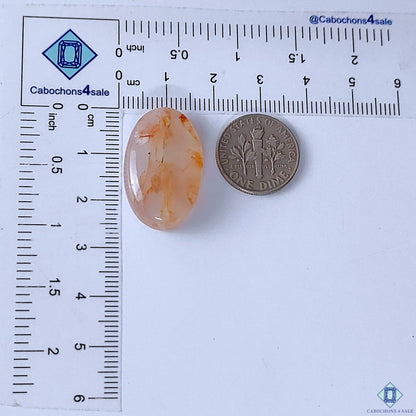 Cabochons4sale oval fire quartz cabochon with red inclusions, translucent finish, 26x16x7mm, shown with a US dime.