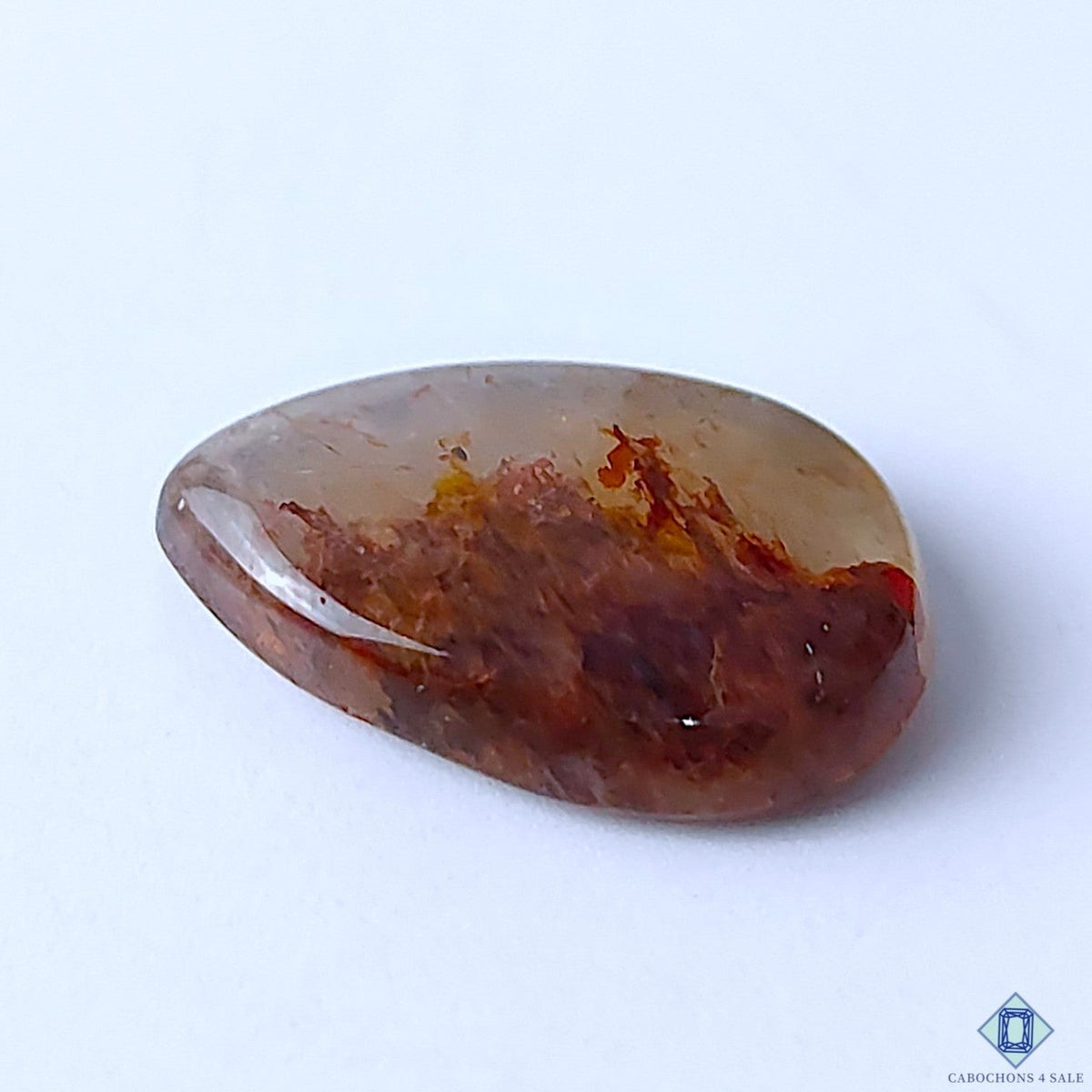Cabochons4sale translucent pear-shaped fire quartz gemstone with red inclusions, 20x14x5mm cabochon.