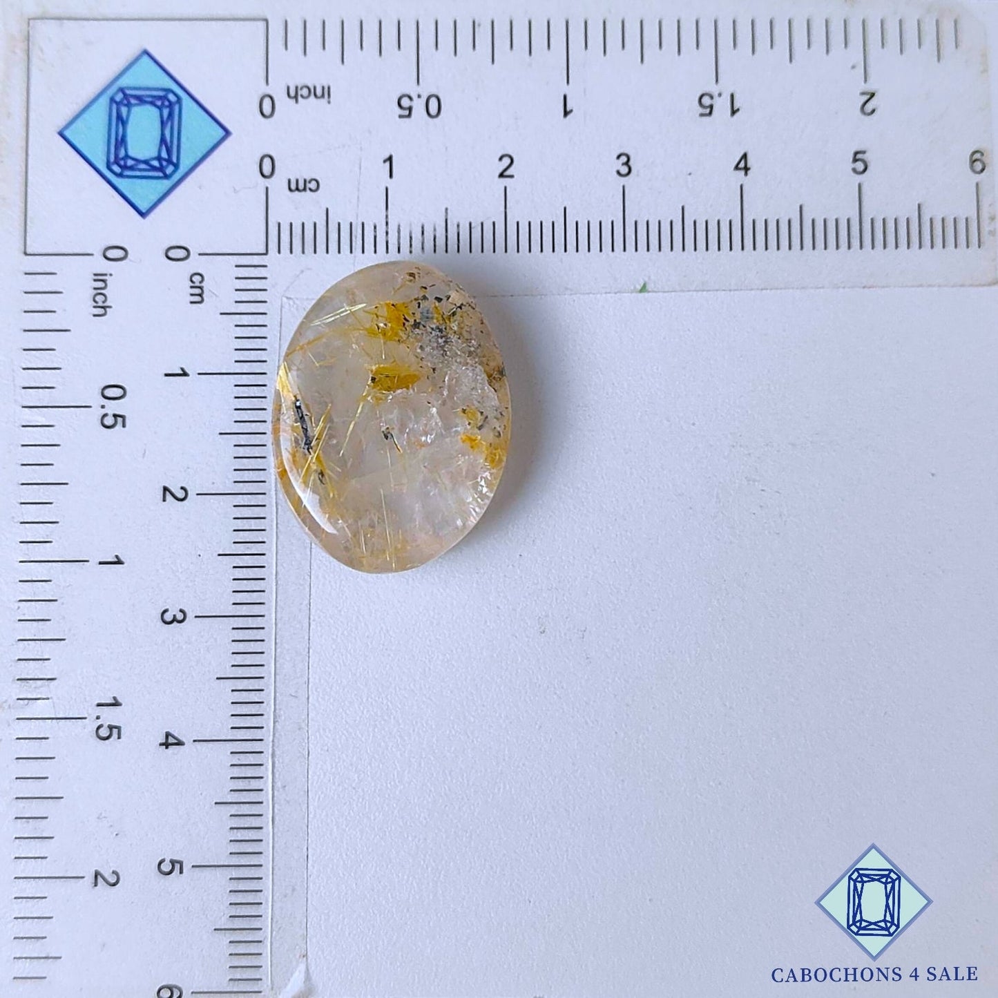 Cabujones ovalados de cuarzo rutilado dorado natural de 25 x 19 x 7 mm, de Brasil, disponibles para la venta.