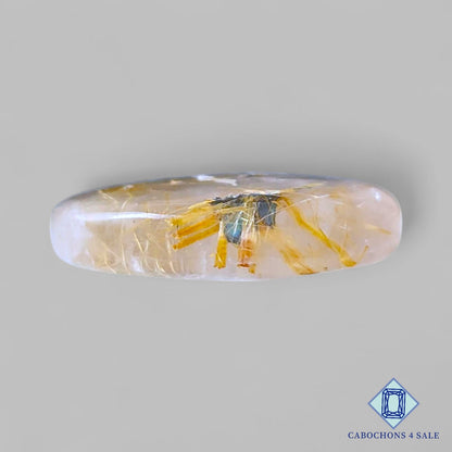 Cabujones ovalados de cuarzo rutilado dorado natural de 25 x 19 x 7 mm, de Brasil, disponibles para la venta.