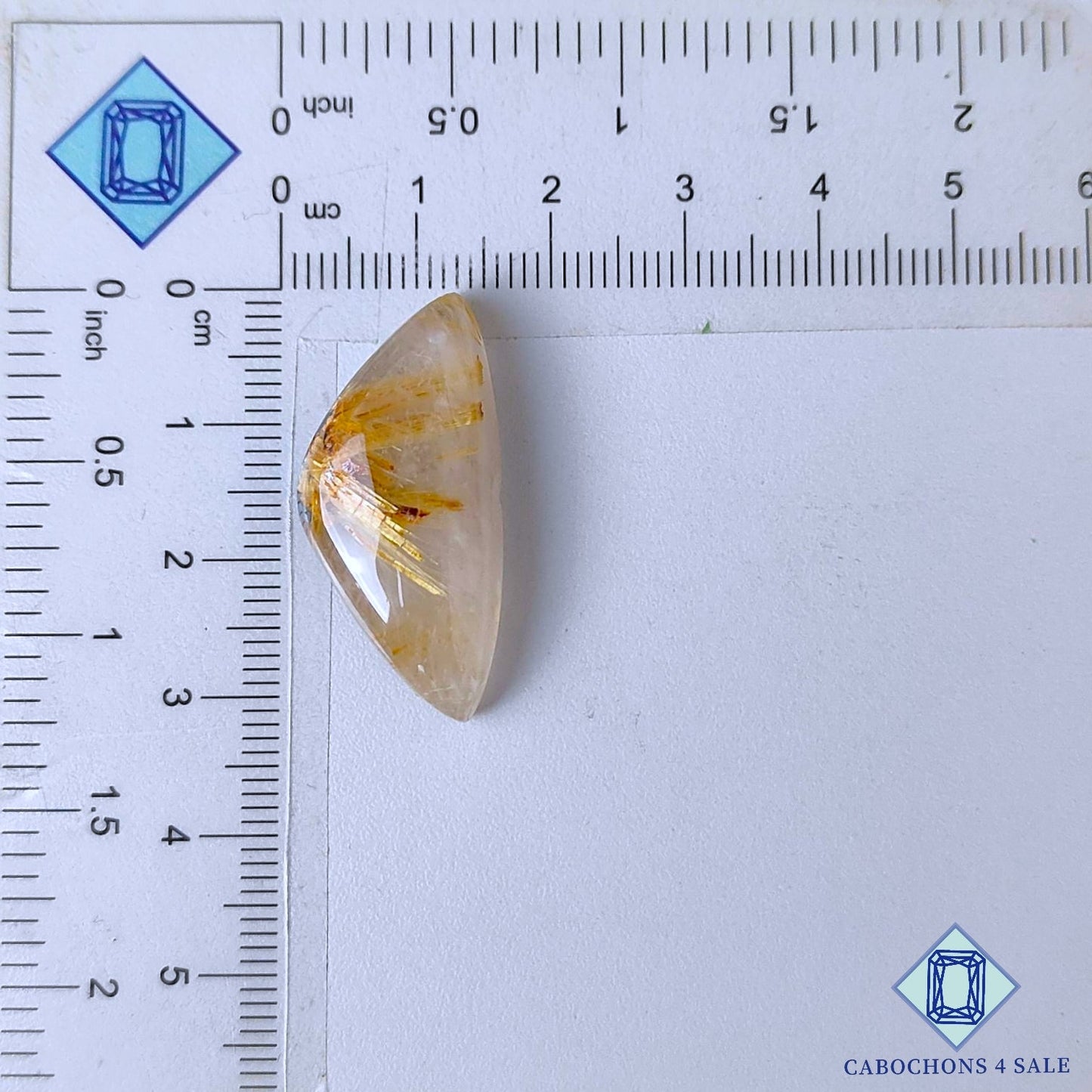 Cabujones de cuarzo rutilado dorado natural de 31 x 14 x 7 mm, de Brasil, disponibles para la venta.