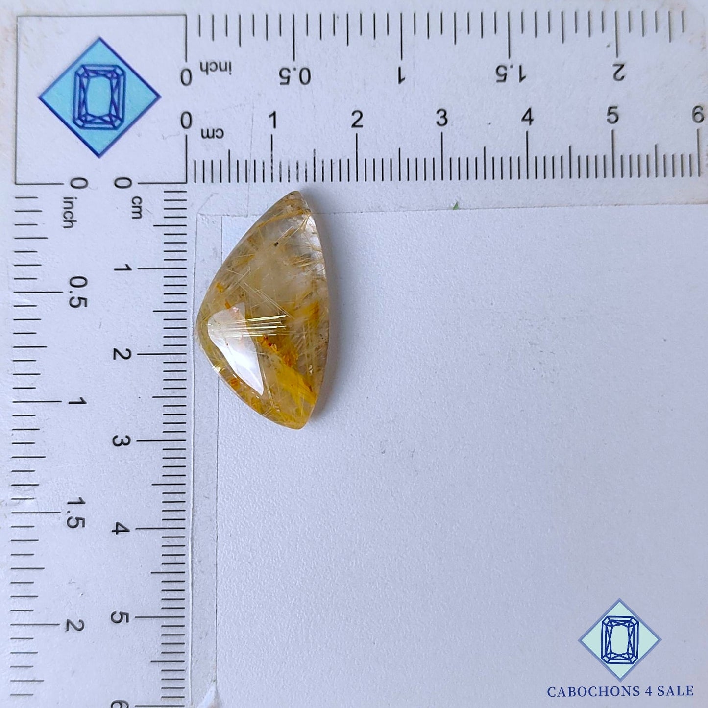 Cabujones de cuarzo rutilado dorado natural de 27 x 15 x 5 mm, de Brasil, disponibles para la venta.