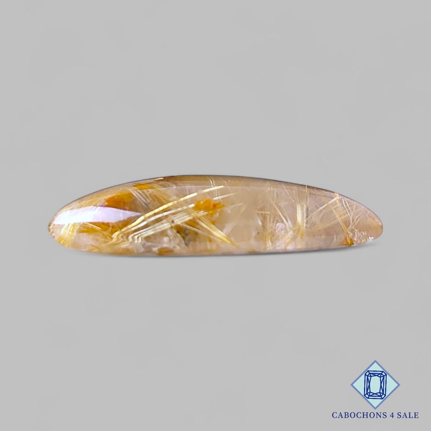 Cabujones de cuarzo rutilado dorado natural de 27 x 15 x 5 mm, de Brasil, disponibles para la venta.