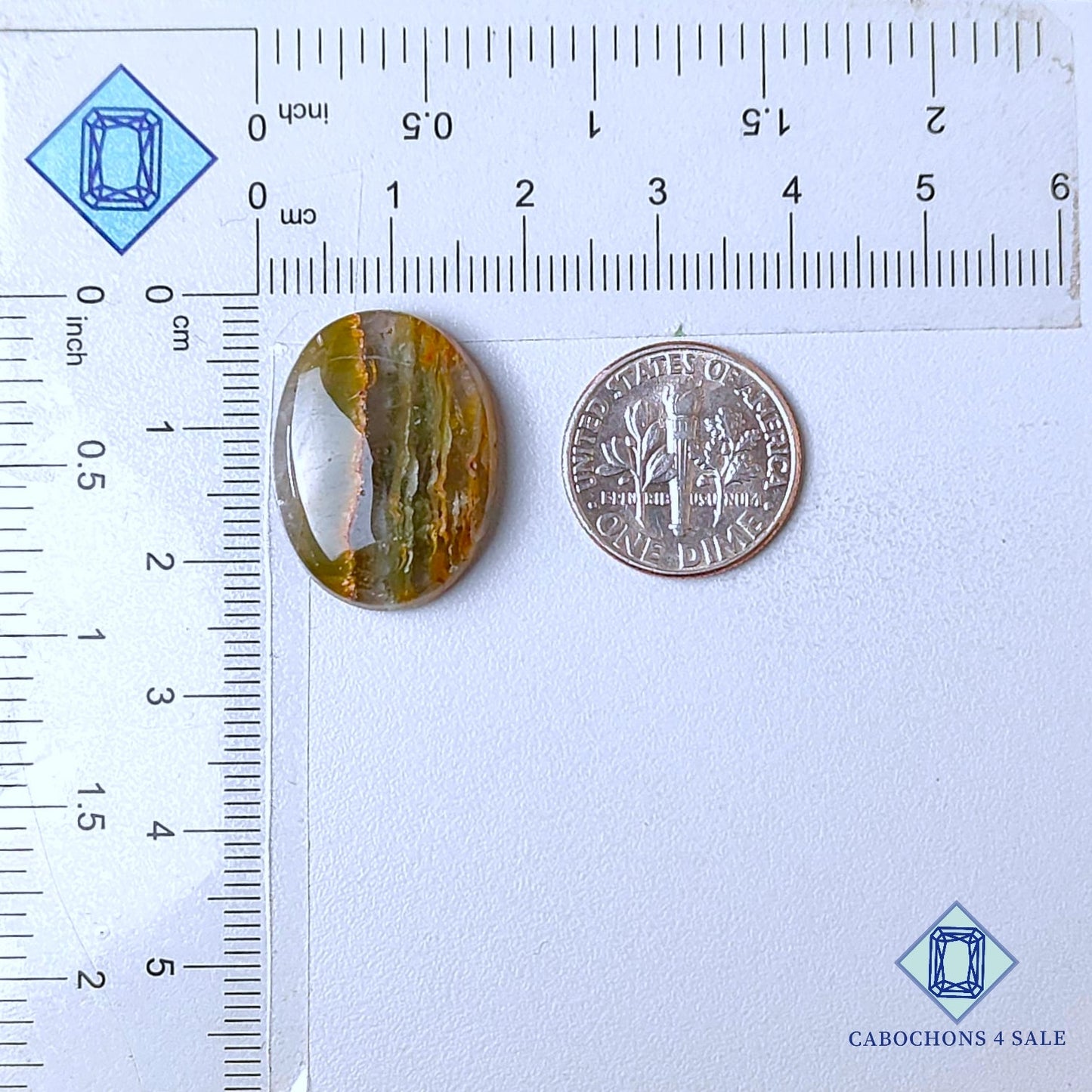 Cabujones ovalados de cuarzo rutilado cacoxenita verde natural de 22 x 17 x 5 mm, de Brasil, disponibles para la venta.