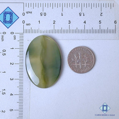 Cabujones ovalados de piedra preciosa de rutilo verde natural de 35 x 24 x 4 mm, procedentes de Brasil, disponibles para la venta.