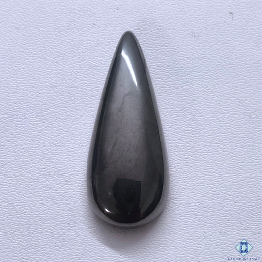Cabochons4sale grey pear-shaped gun metal cabochon gemstone with a smooth opaque finish, 31x12x6mm.