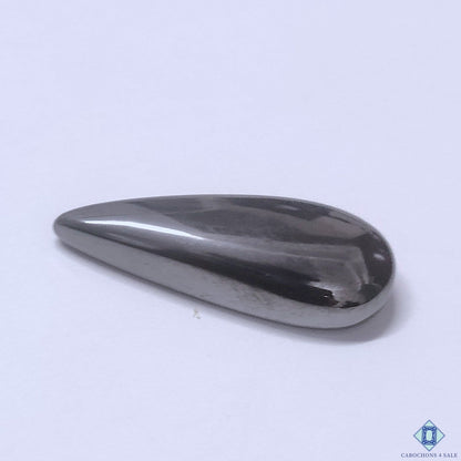 Cabochons4sale grey gun metal pear cabochon gemstone with a smooth opaque finish, 31x12x6mm size.