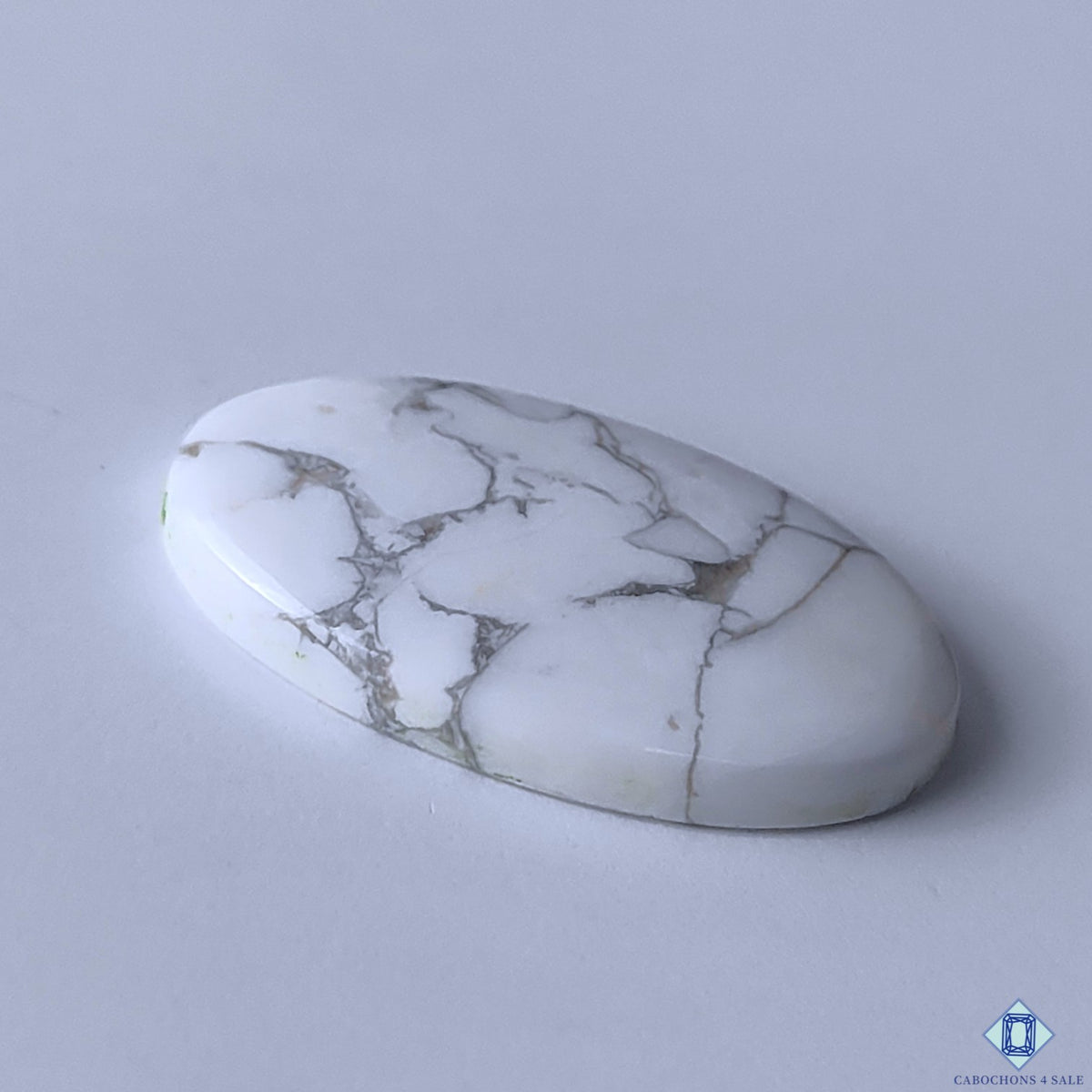 0-Howlite-C4sw22953-3-Oval-White-mm-Cabochons-Opaque-0