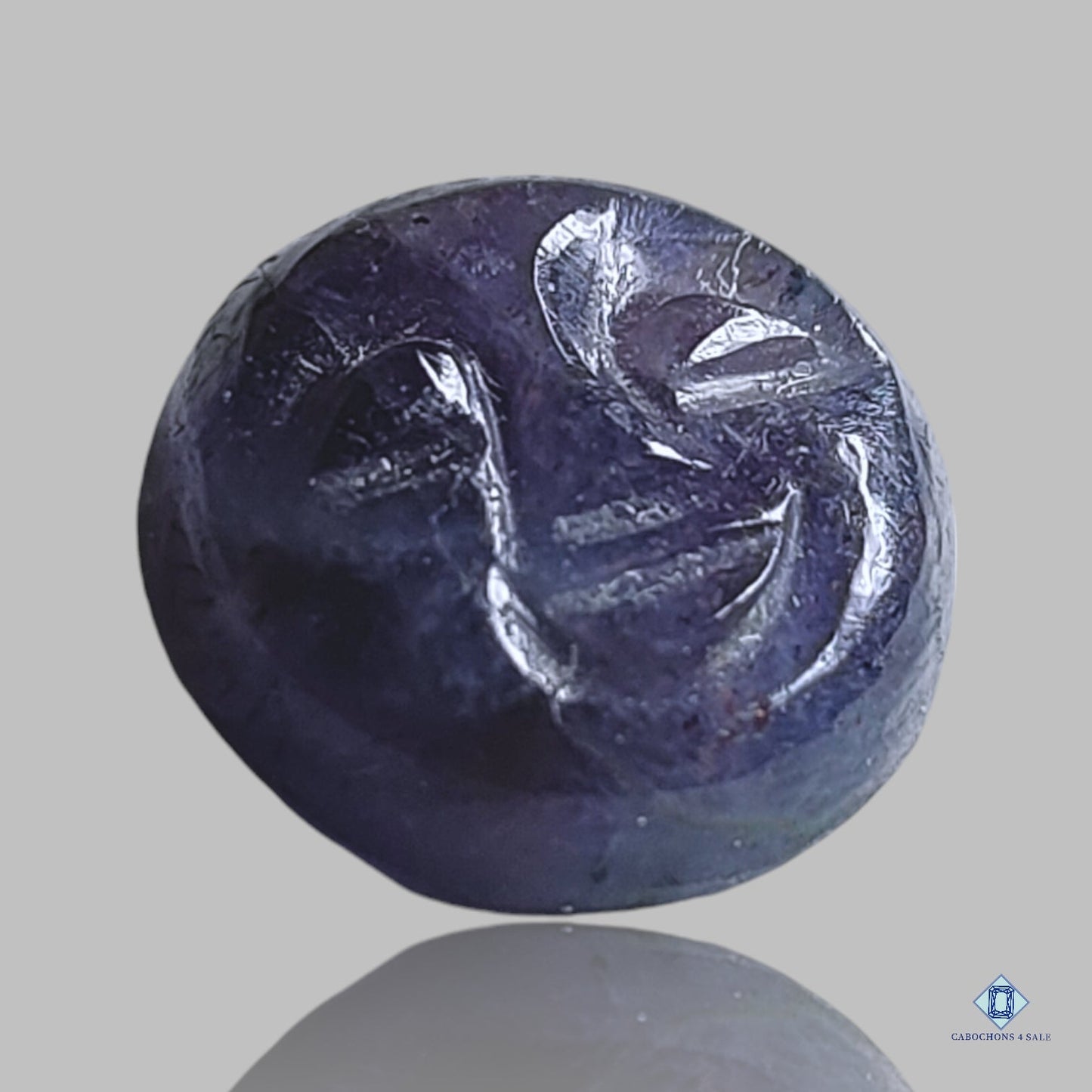 Iolite Round Carvings