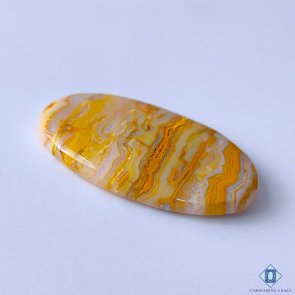 0-Java_Lace_Agate-C4sw23044-3-Oval-Yellow-mm-Cabochons-Opaque-0