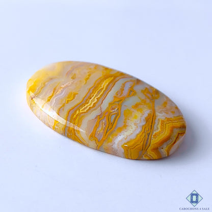 0-Java_Lace_Agate-C4sw23045-3-Oval-Yellow-mm-Cabochons-Opaque-0
