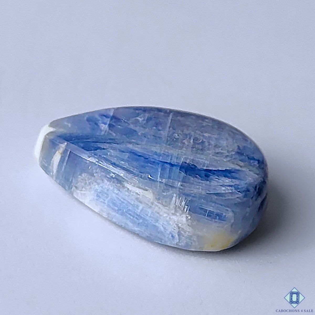 0-Kyanite-C4sw22968-3-Pear-Blue-mm-Cabochons-Opaque-0