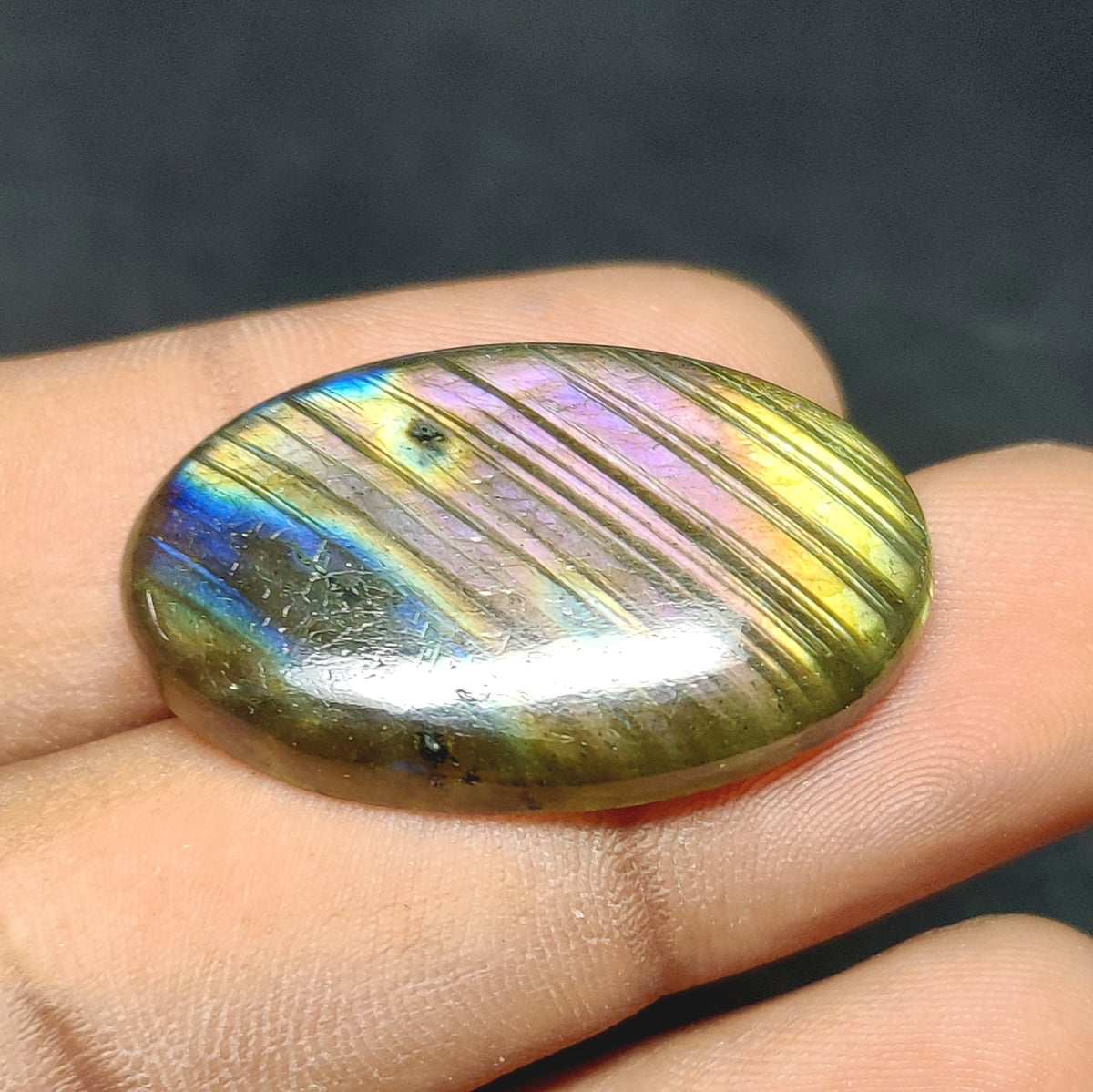 Cabochons4sale oval labradorite cabochon with iridescent multi-colour flash and carved linear texture