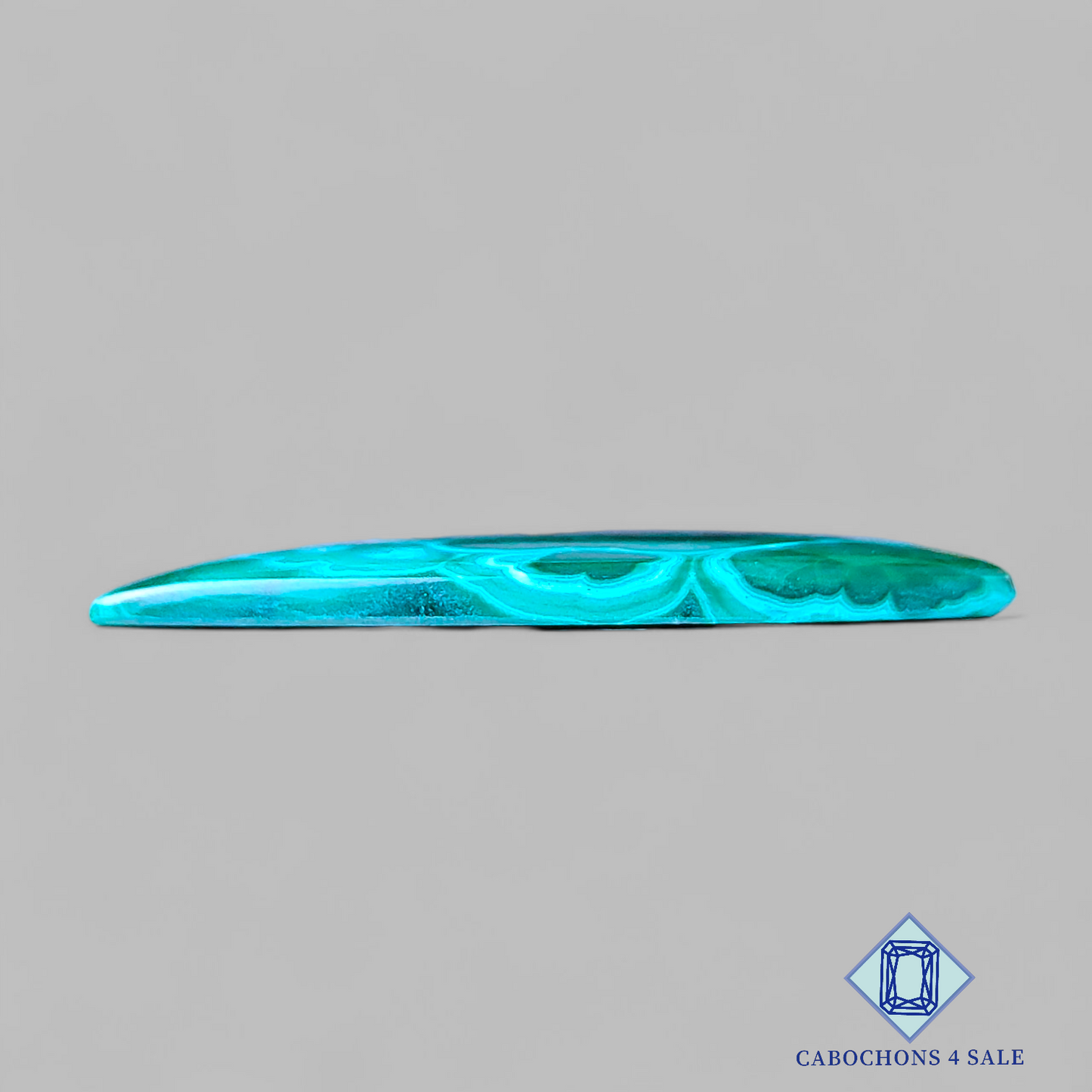 Cabujones triangulares de malaquita