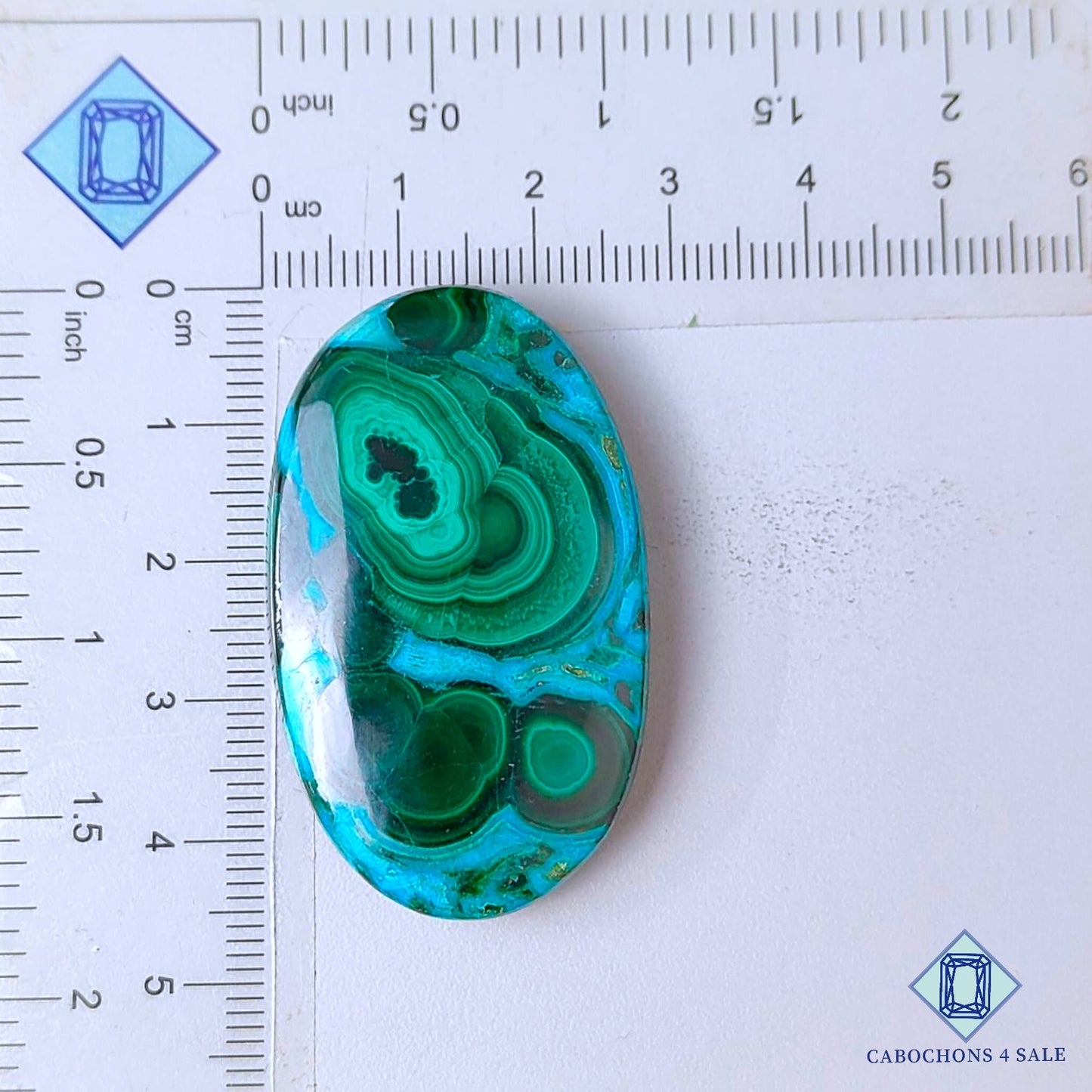 Cabujones ovalados de malaquita crisolcola natural de 45 x 27 x 8 mm, procedentes de la República Democrática del Congo, disponibles para la venta.