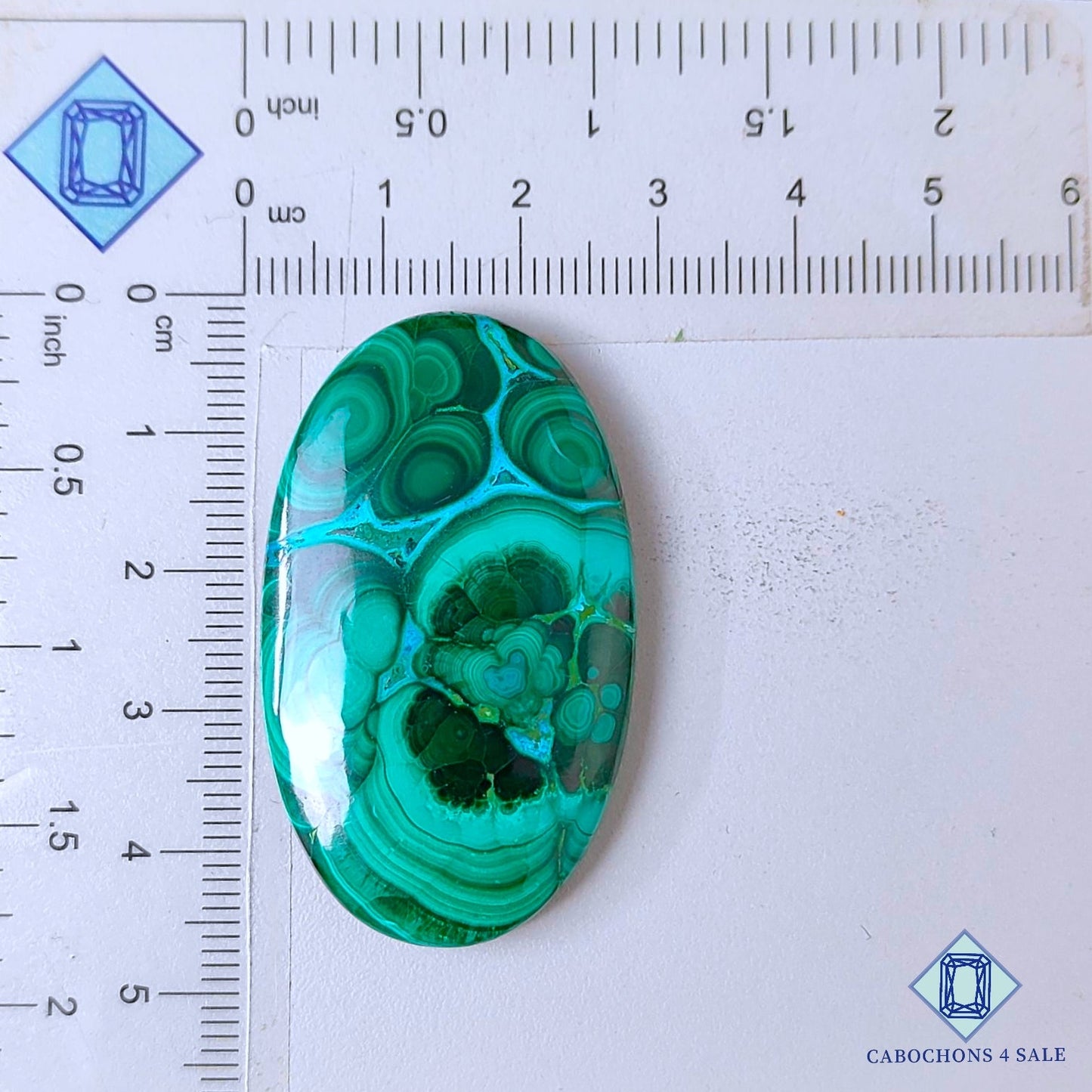 Cabujones ovalados de malaquita crisolcola natural de 45 x 26 x 5 mm, procedentes de la República Democrática del Congo, disponibles para la venta.