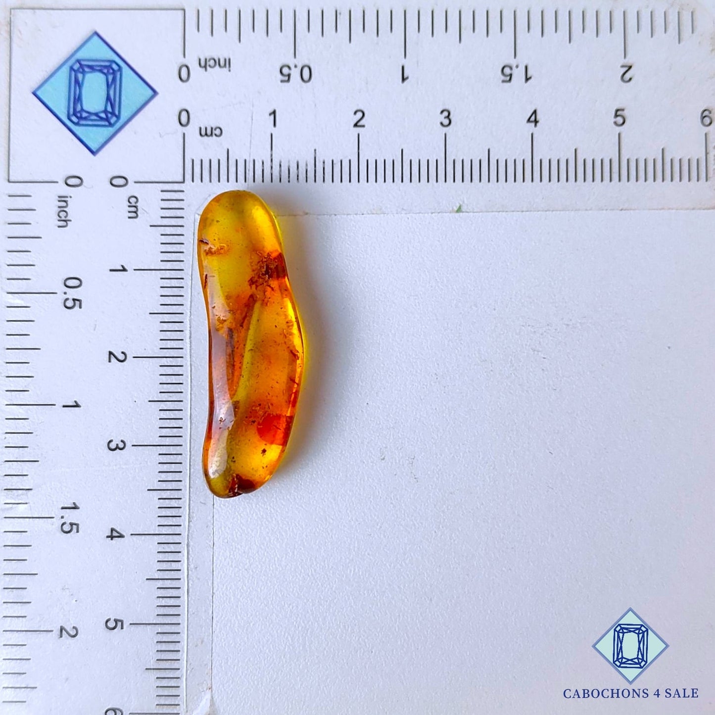 Manmade Amber Gemstone  Fancy Cabochons 34*10*6mm available for sale