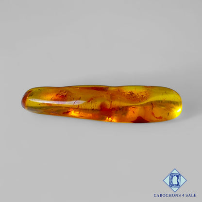 Manmade Amber Gemstone  Fancy Cabochons 34*10*6mm available for sale