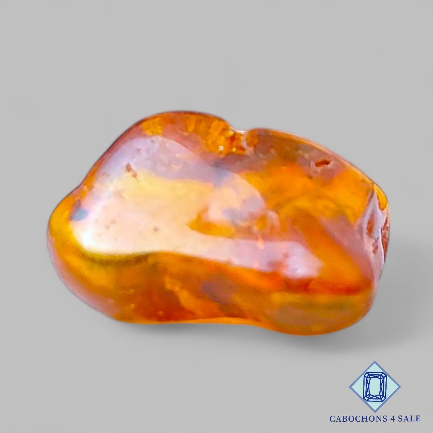 Cabujones de ámbar sintético de 18 x 19 x 11 mm disponibles para la venta.