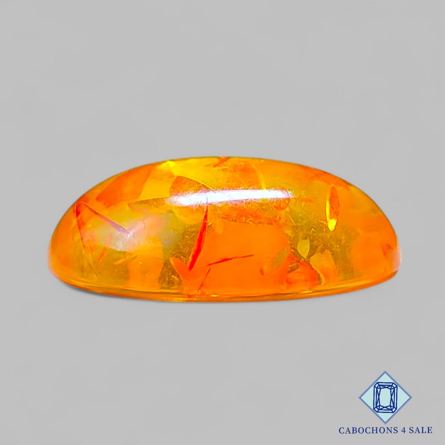 Cabujones ovalados de ámbar sintético de 23 x 17 x 7 mm disponibles para la venta.