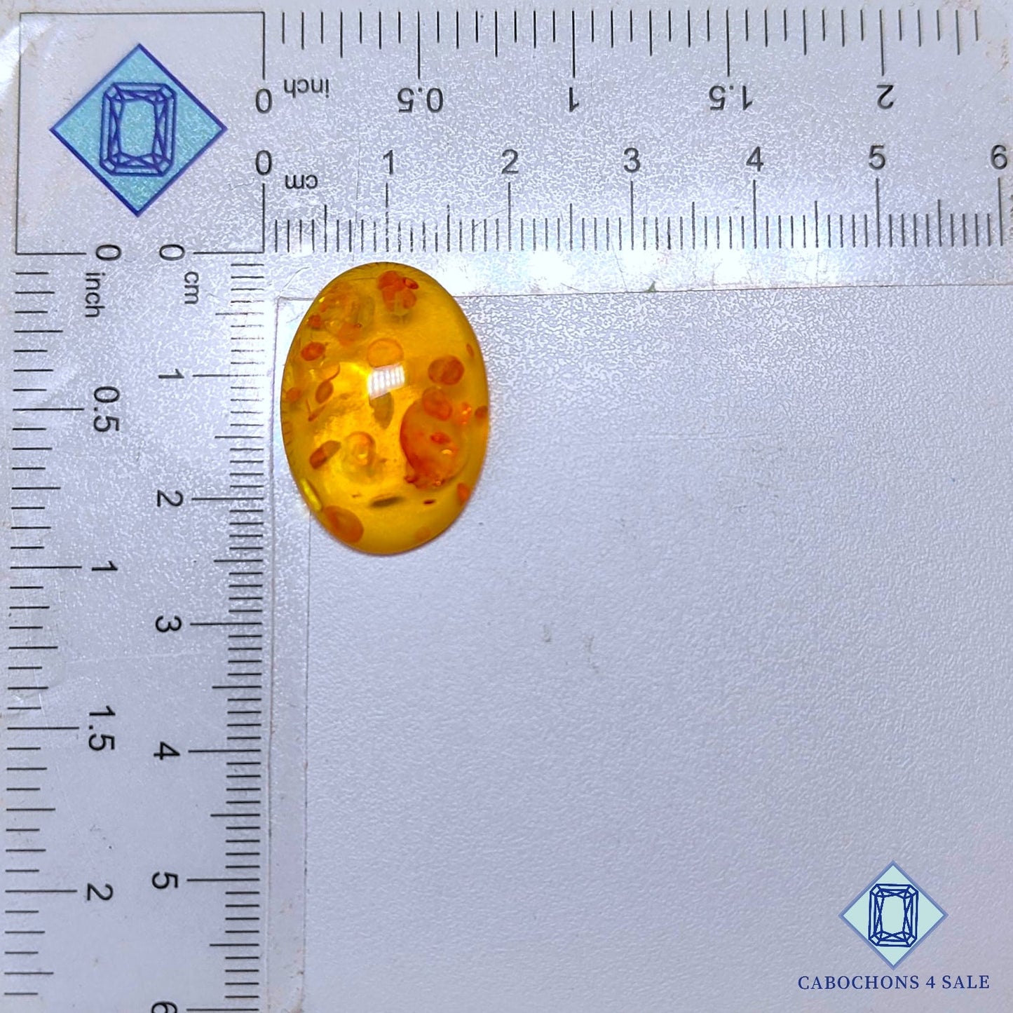 Cabujones ovalados de ámbar sintético de 23 x 16 x 6 mm disponibles para la venta.