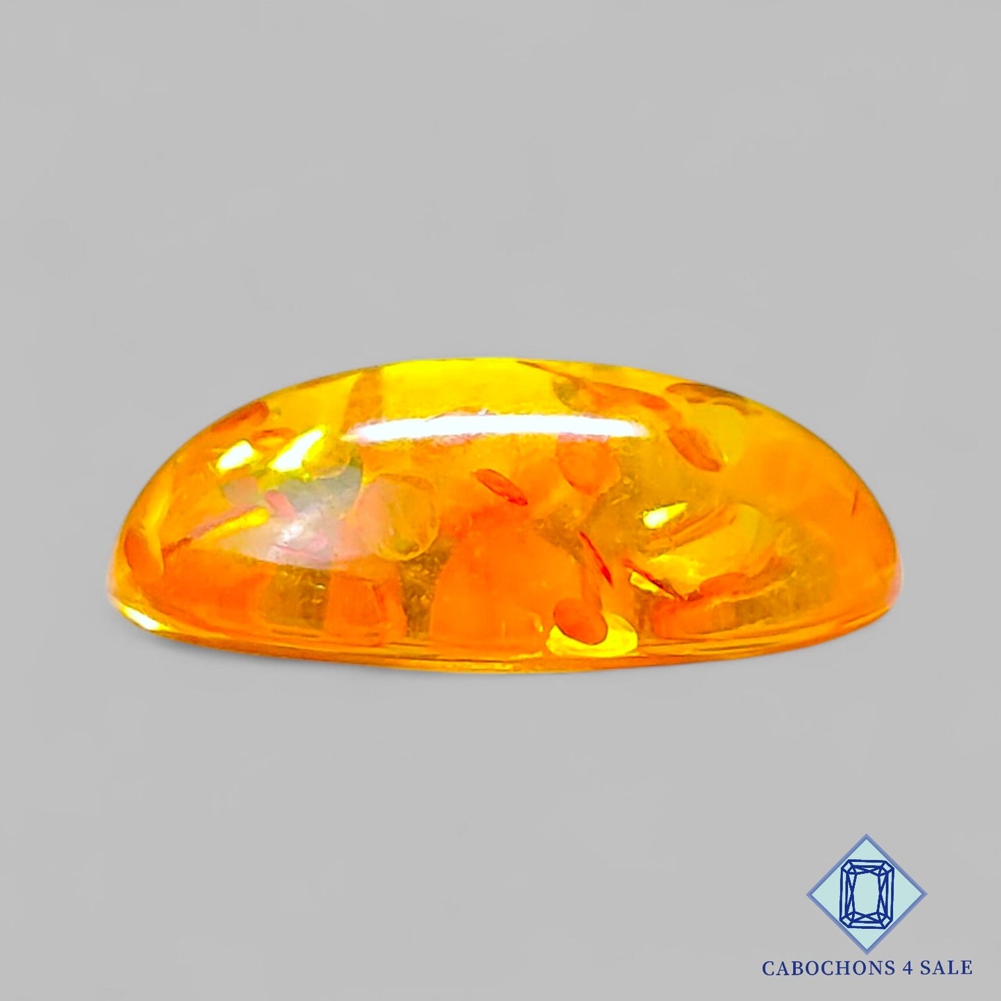 Cabujones ovalados de ámbar sintético de 23 x 17 x 7 mm disponibles para la venta.