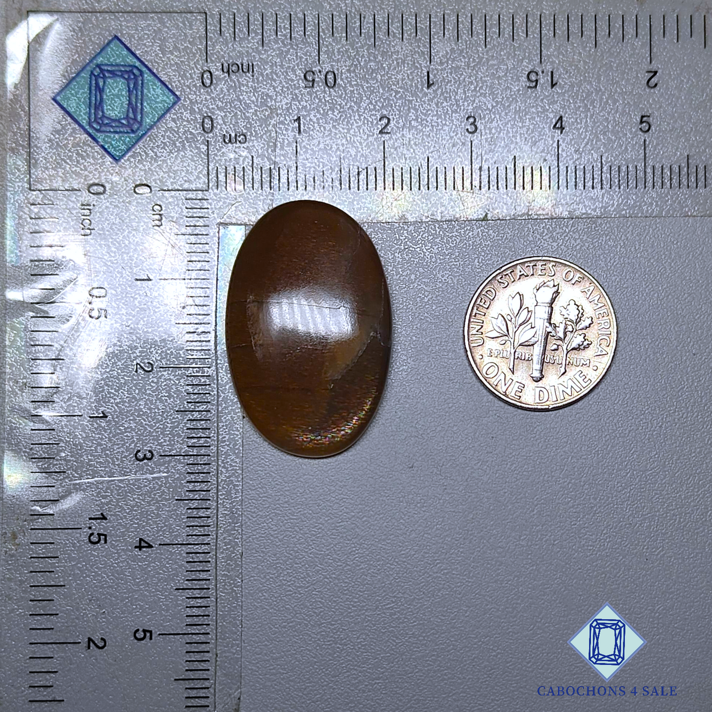 Cabujones ovalados de piedra solar con enrejado arcoíris de lluvia de meteoritos