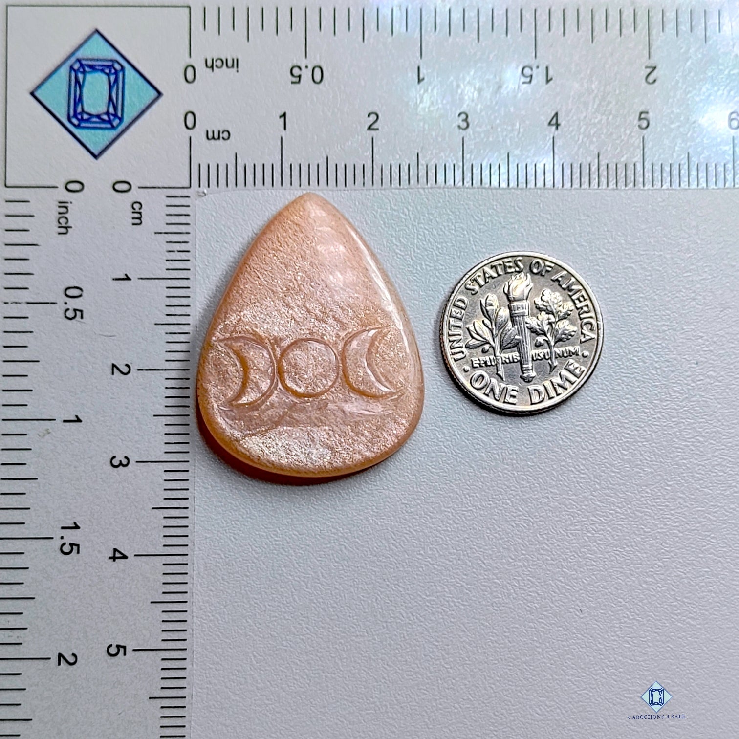 0-Peach_Moonstone-c4sw2314-2-Pear-Peach-30_35mm-Carvings-Opaque-0