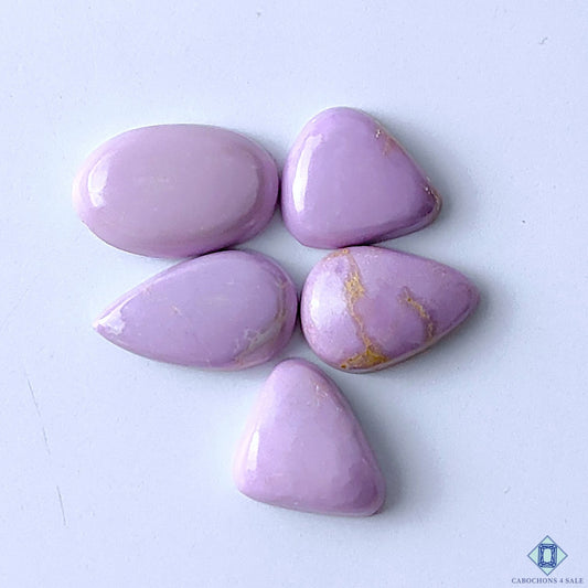 Cabochons4sale purple phosphosiderite gemstone lot in mixed shapes with opaque finish and smooth polished surfaces