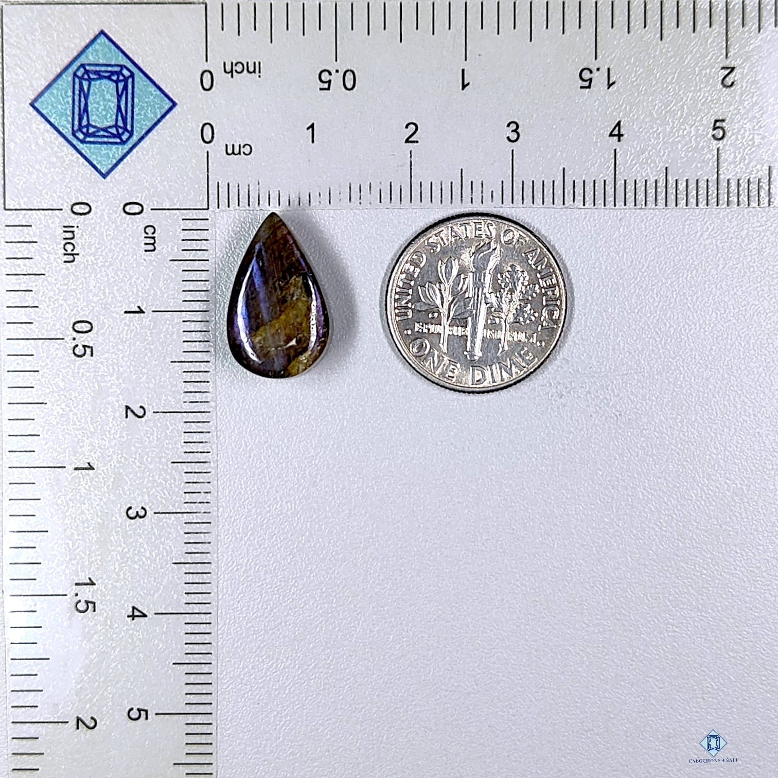 0-Purple_Labradorite-c4sv6022-2-Triangle-Purple-mm-Cabochons-Translucent-0