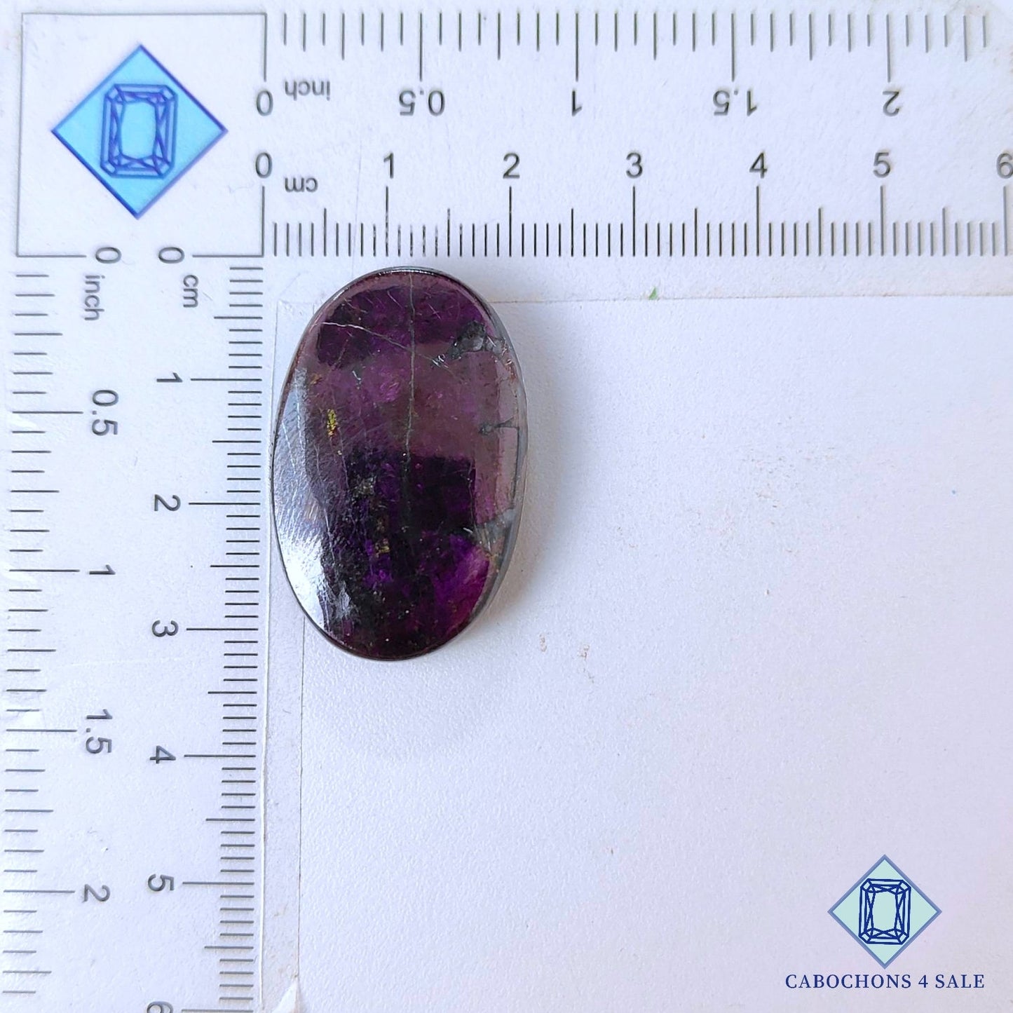 Cabujones ovalados de purpurita natural de 31 x 20 x 6 mm, procedentes de Namibia, disponibles para la venta.